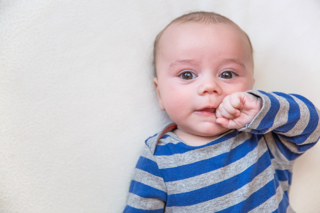 Baby in a striped shirt