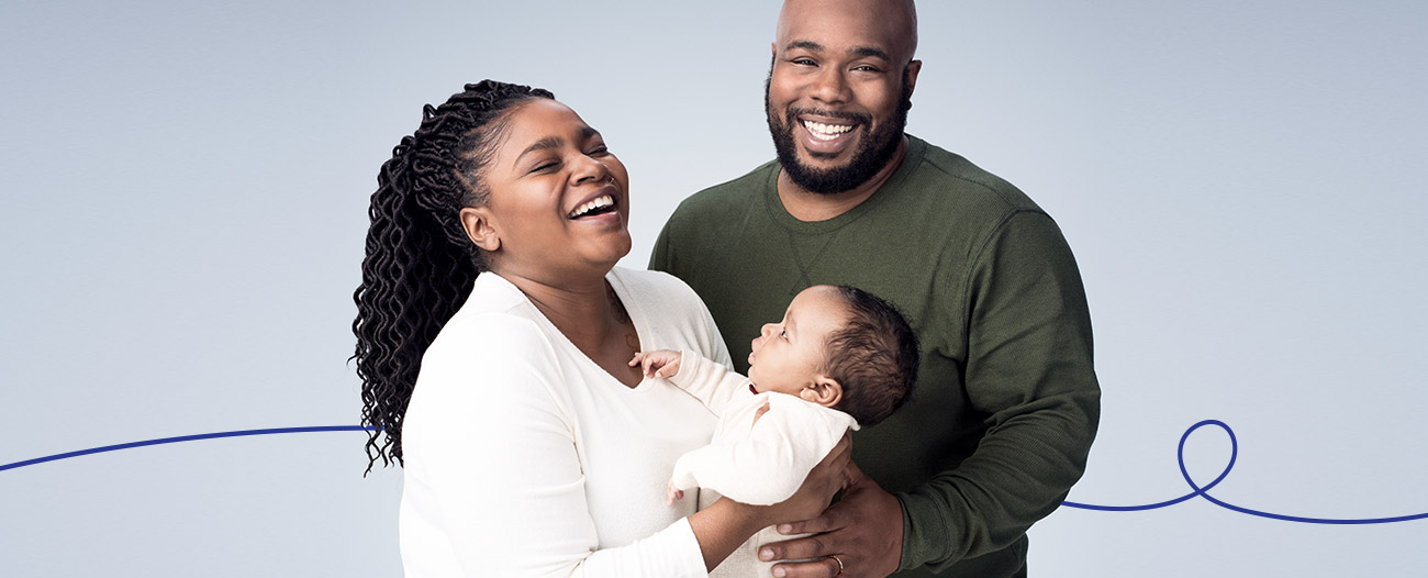 Image of a mother and father and their baby