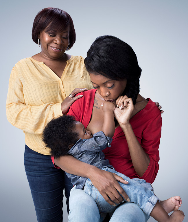 Image of a grandmother and her daughter and grandchild