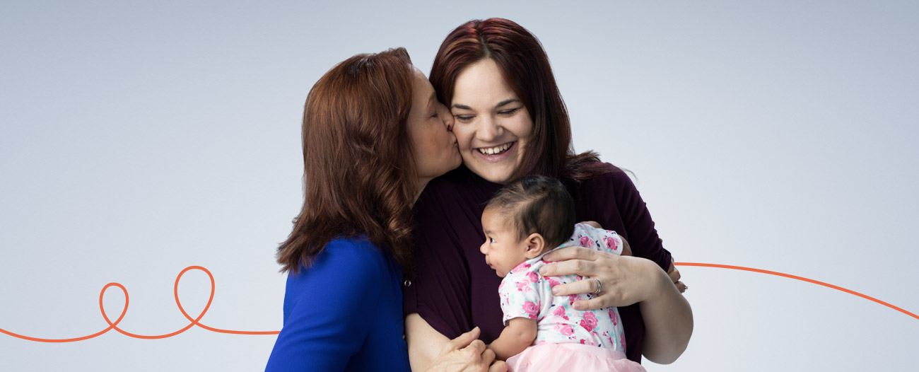 Image of a grandmother and her daughter and grandchild