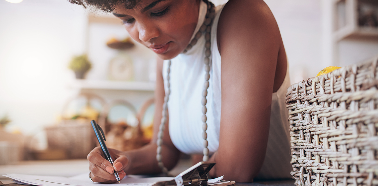 Image of a woman writing