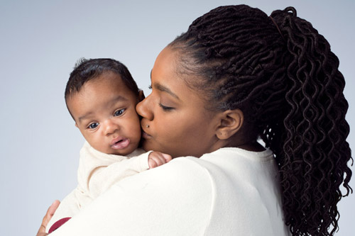 Image of a mother breastfeeding her baby