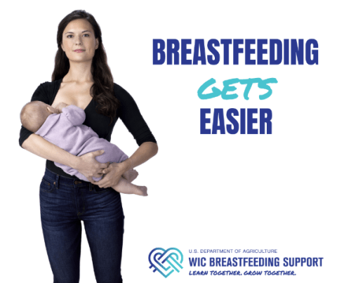 Breastfeeding parent holding baby